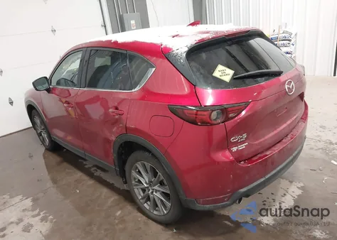 2021 Mazda Cx-5 Grand Touring z USA, uszkodzony, nr VIN JM3KFBDM4M0498894